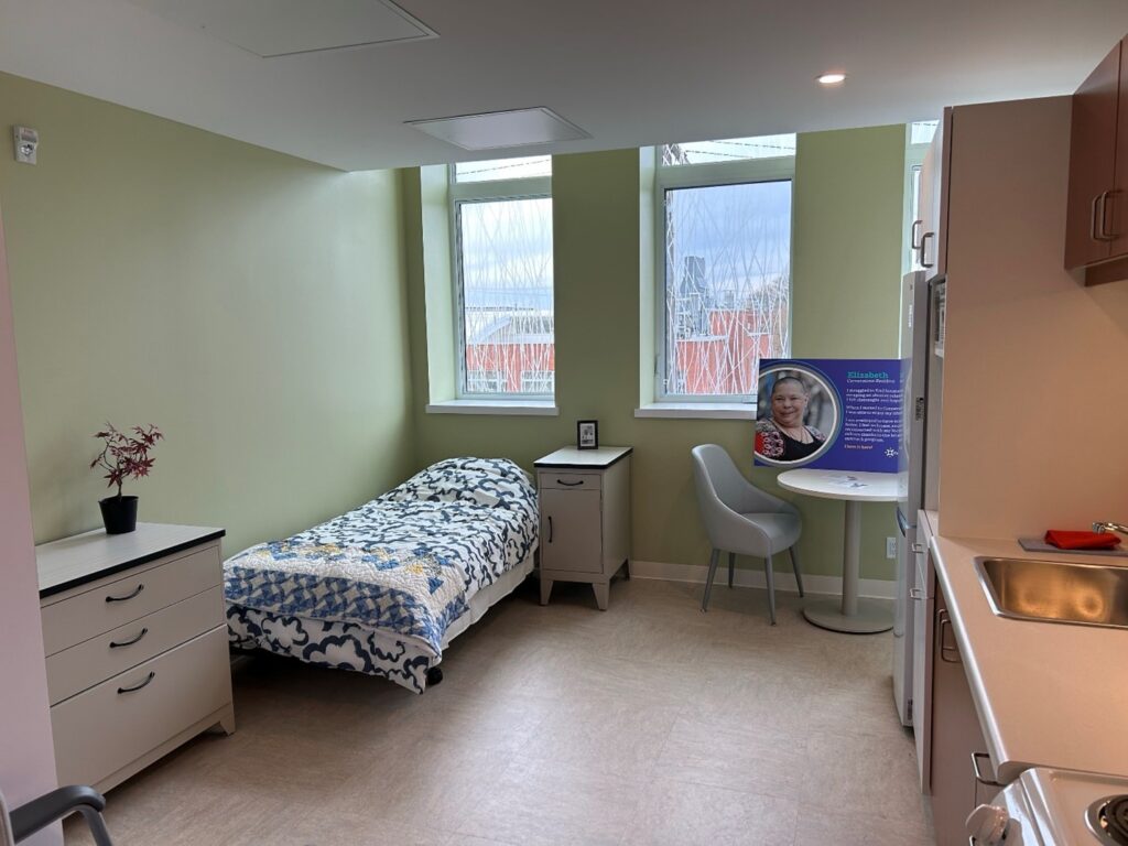Image of a barrier free unit, includes furniture.